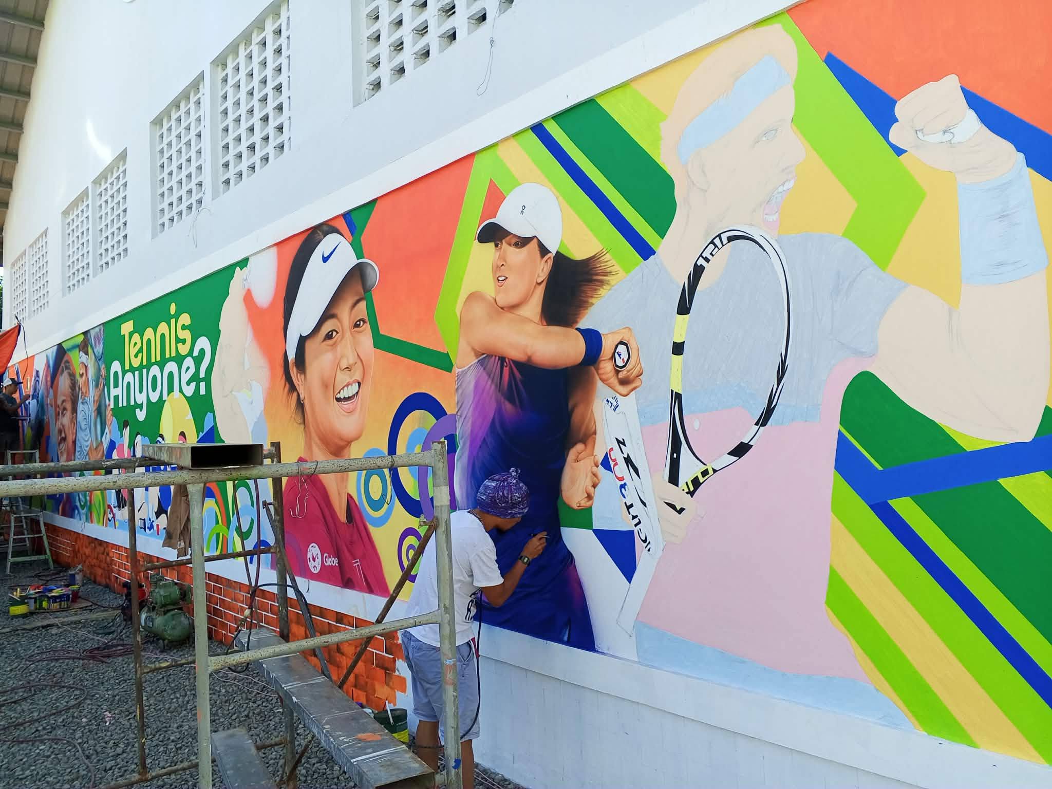 tennis court mural depiction of past tennis players